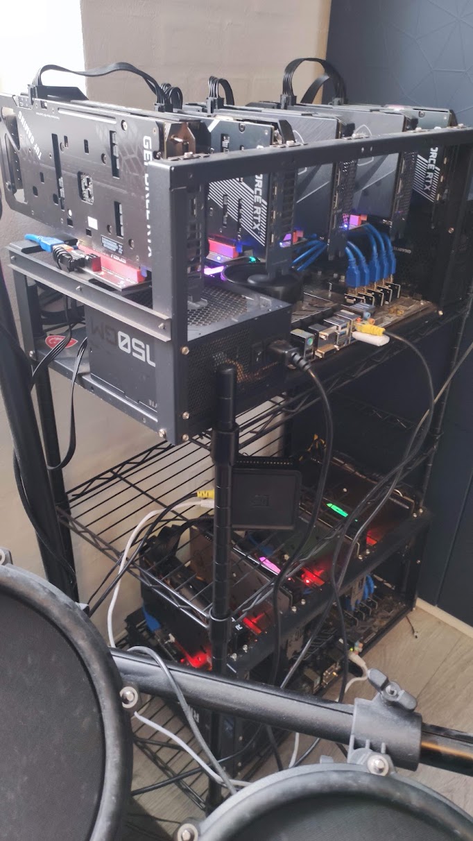 An open-frame mining rig with multiple GPUs and riser cables